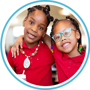 circle image of children with arms around each other