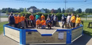 Dylan Sweet and Eagle Scout troop inside Gaga Ball pit