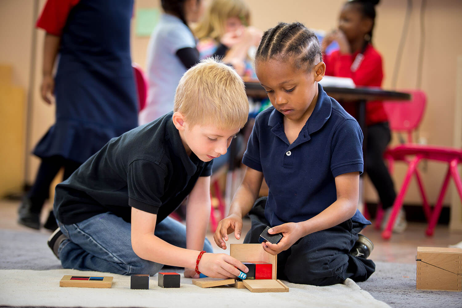 Students at Creative Montessori Academy working in class